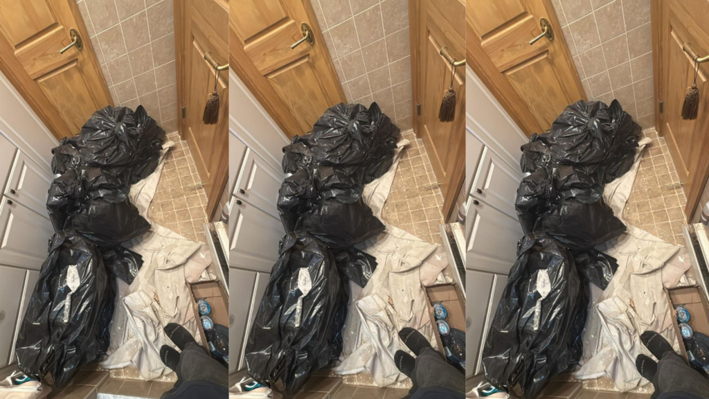 Bathroom remodeling and leak repair in Hoboken NJ by Quick Sidekick showing new tiled floor and installed toilet