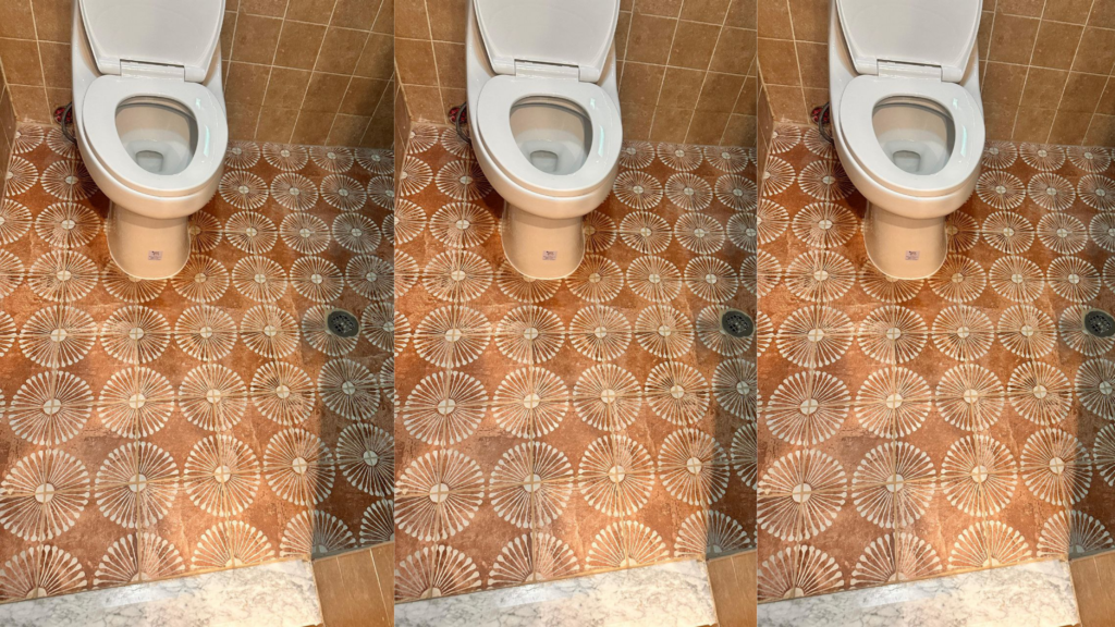 Damaged bathroom floor in Hoboken before repair by Quick Sidekick