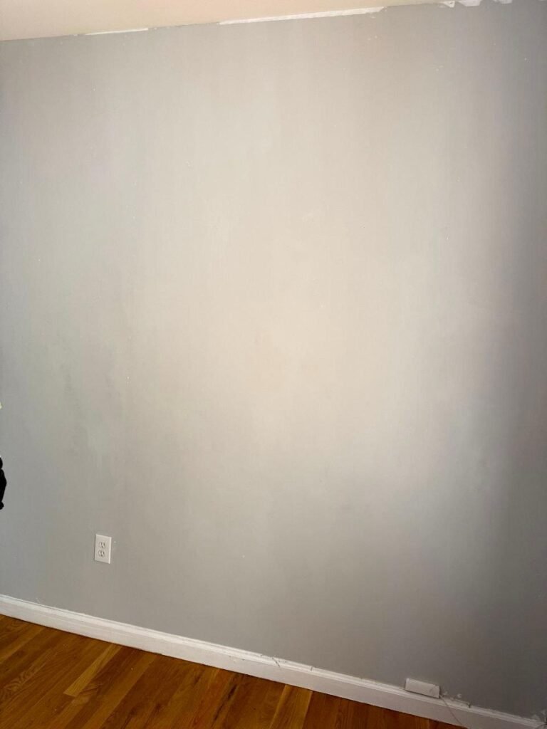 Freshly painted, repaired wall (no wallpaper).