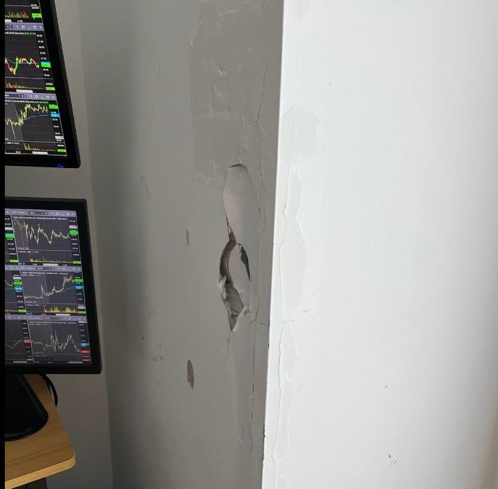The large drywall hole before repair. (2)