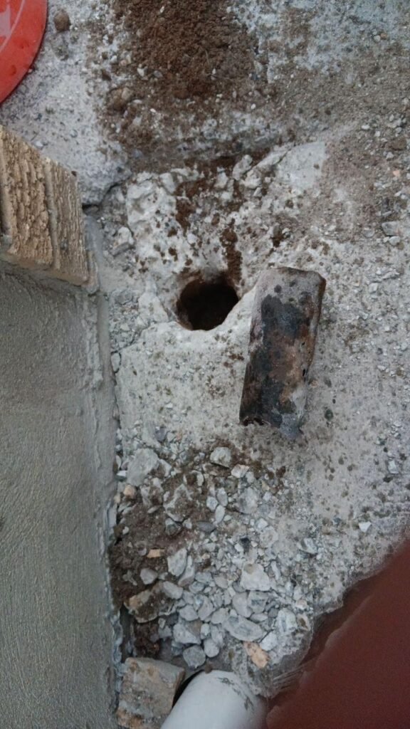 Open hole in the ground prepared for repair or construction work