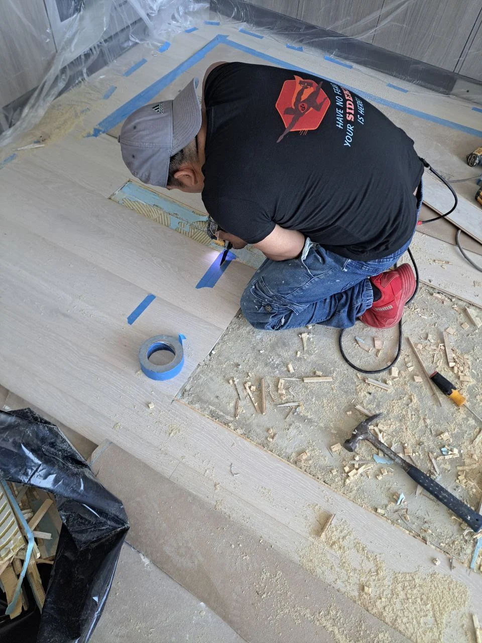 Handyman working on flooring in Hoboken NJ